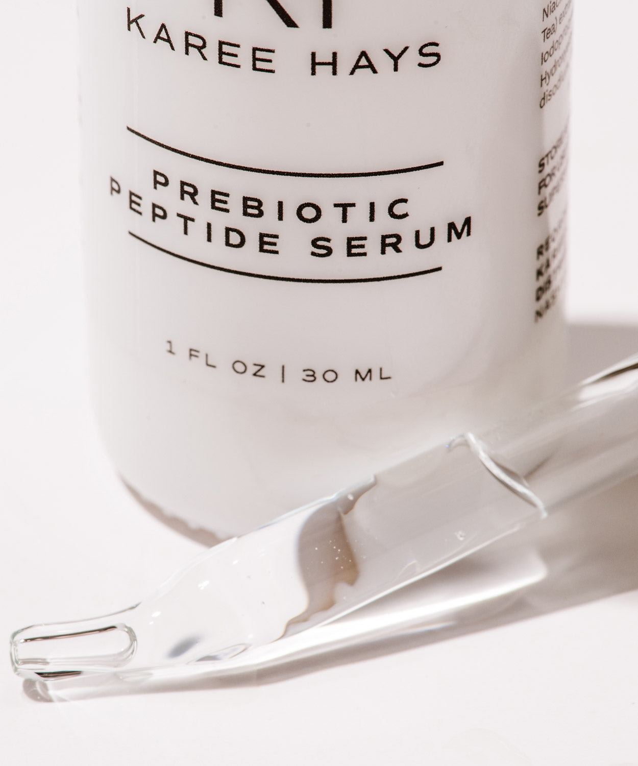 Karee Hays prebiotic peptide serum bottle with dropper