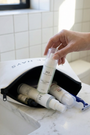 KH Travel Kit on Bathroom Counter