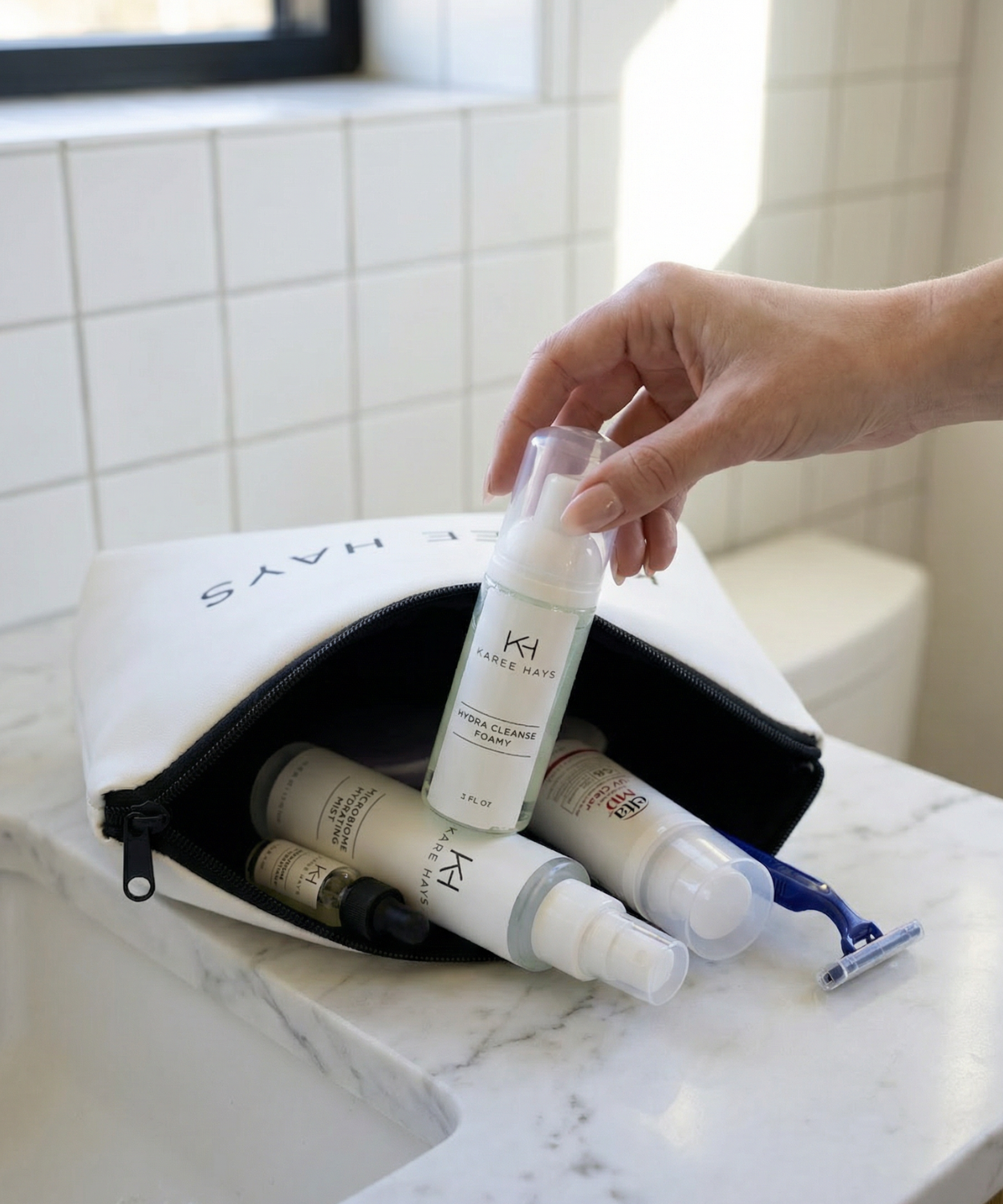 KH Travel Kit on Bathroom Counter