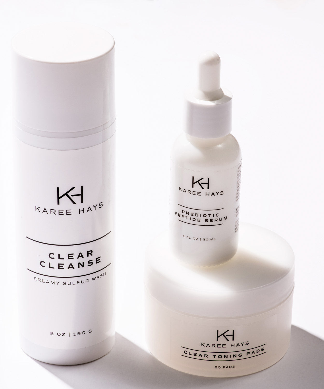Karee Hays skincare products bundle set including Clear Cleanse, Clear Toning Pads and Prebiotic Peptide Serum