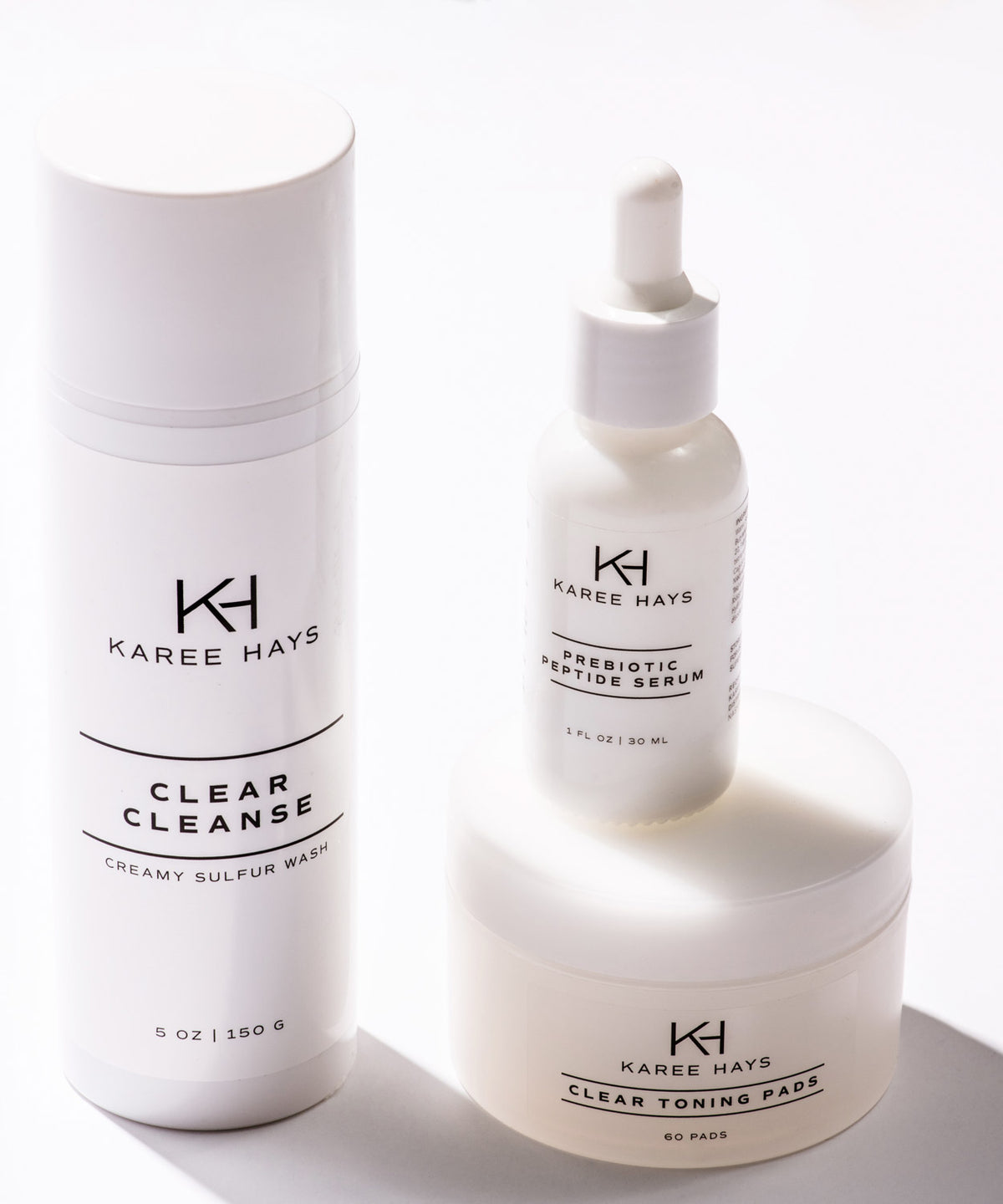 Karee Hays skincare products bundle set including Clear Cleanse, Clear Toning Pads and Prebiotic Peptide Serum