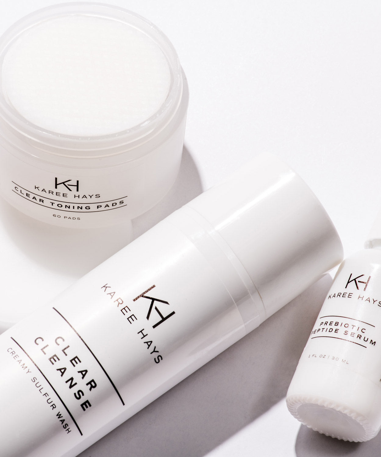 Karee Hays skincare products set including Clear Cleanse, Clear Toning Pads and Prebiotic Peptide Serum