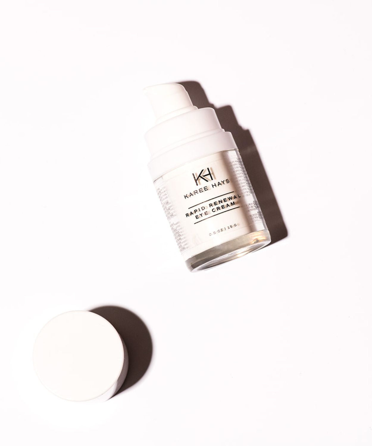 KH eye cream jar on a white background